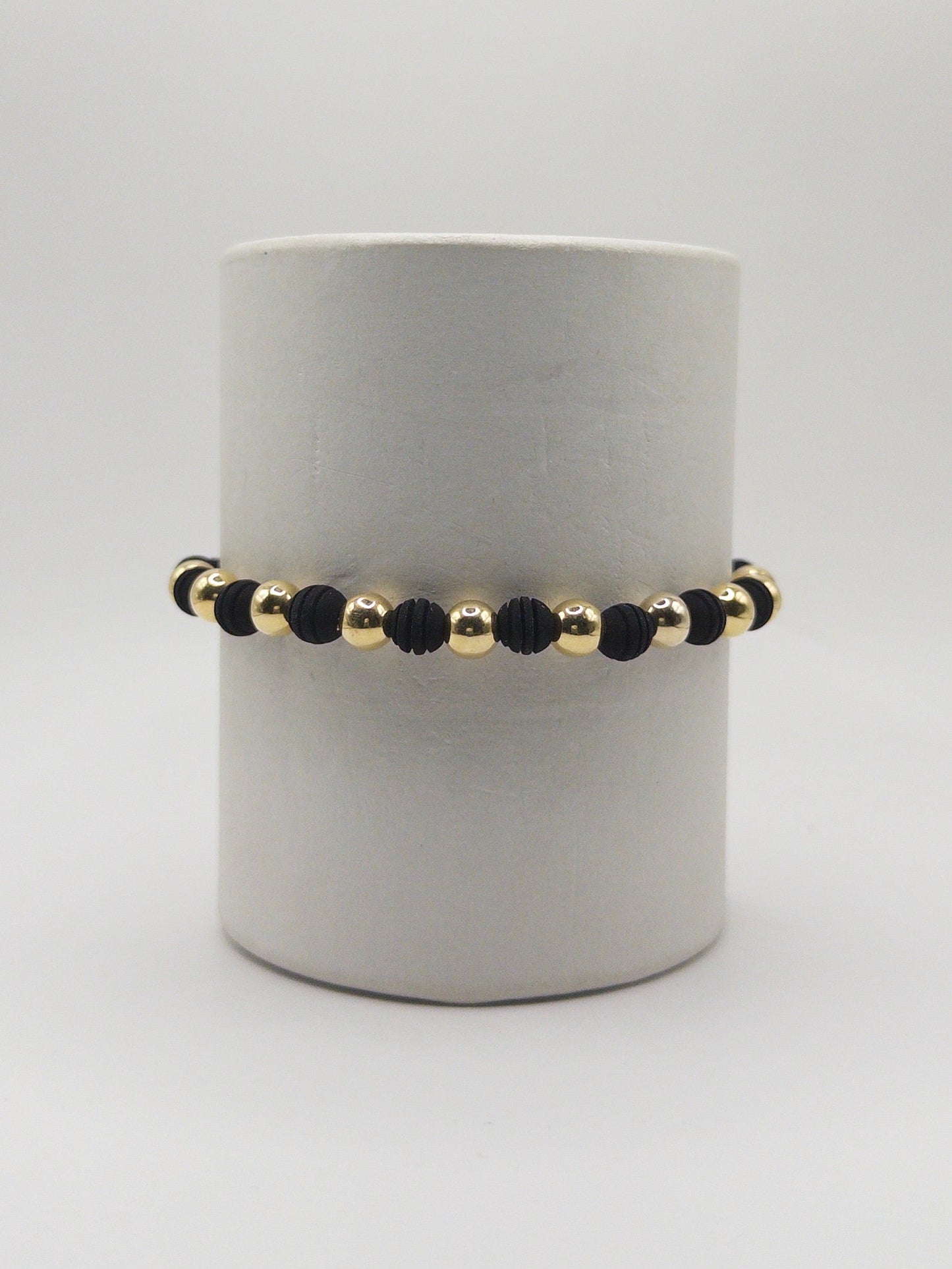 TEJIDA 10 BALINES #6 LISO CON NEOPRENO NEGRO RAYADO ORO LAMINADO 18K