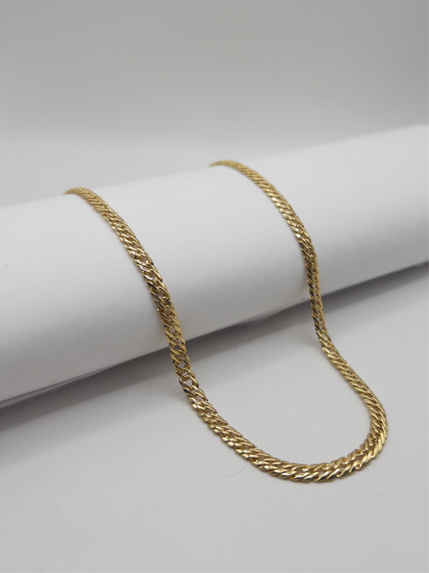 CADENA ENTRELAZADA HOMBRE ORO LAMINADO 18K