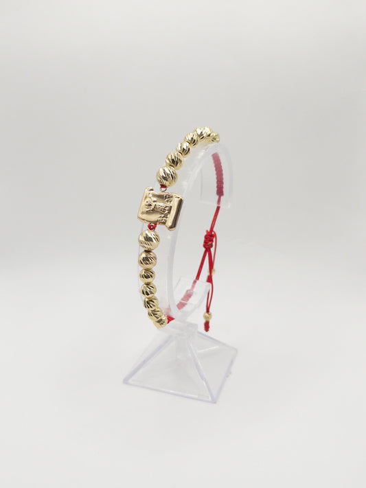 TEJIDA DIVINO NIÑO GRANDE ORO LAMINADO 18K