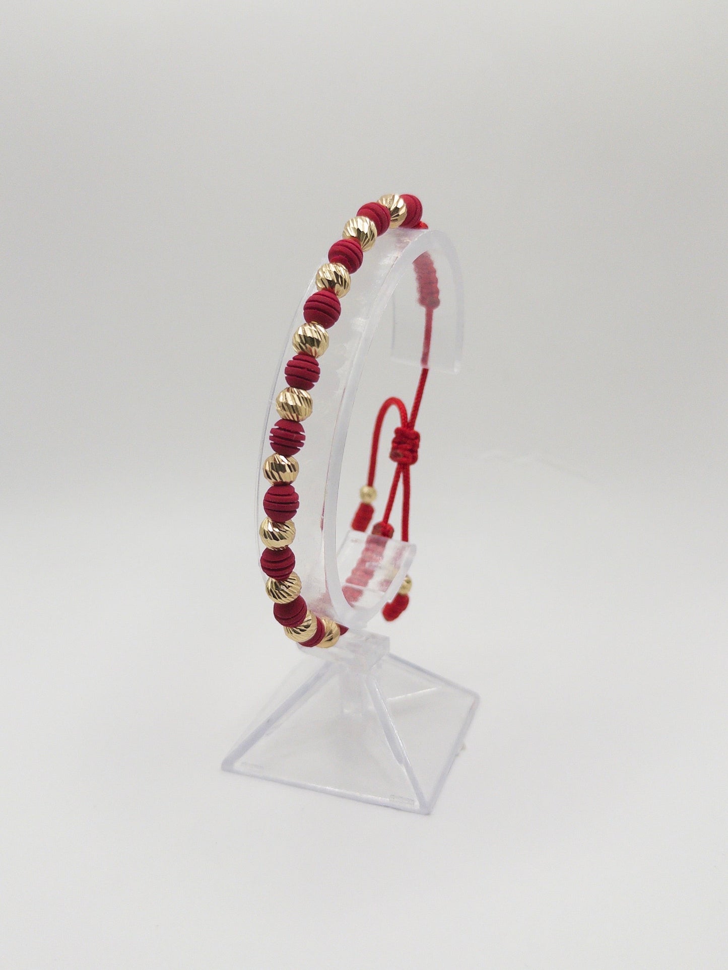 TEJIDA 10 BALINES #6 DIAMANTADOS CON NEOPRENO ROJO RAYADO ORO LAMINADO 18K